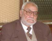 عاكف يؤدي صلاة الغائب على الشيخ ياسين.jpg