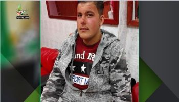 أسير يسكب الماء الساخن.jpg