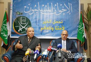 البرادعى والكتاتنى خلال المؤتمر الصحفى.jpg